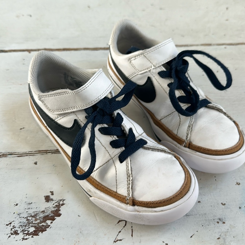 Nike Court kids size 1. White with black swoosh and navy laces.